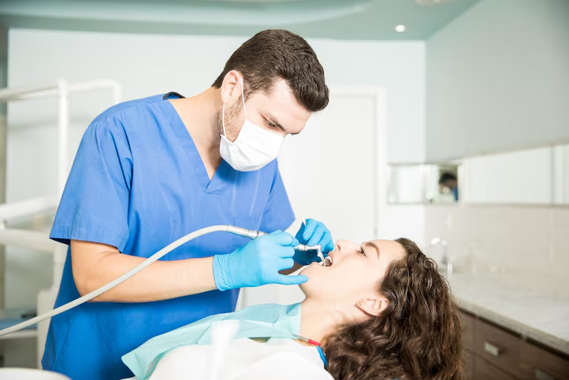 Patient getting dental care from dentist